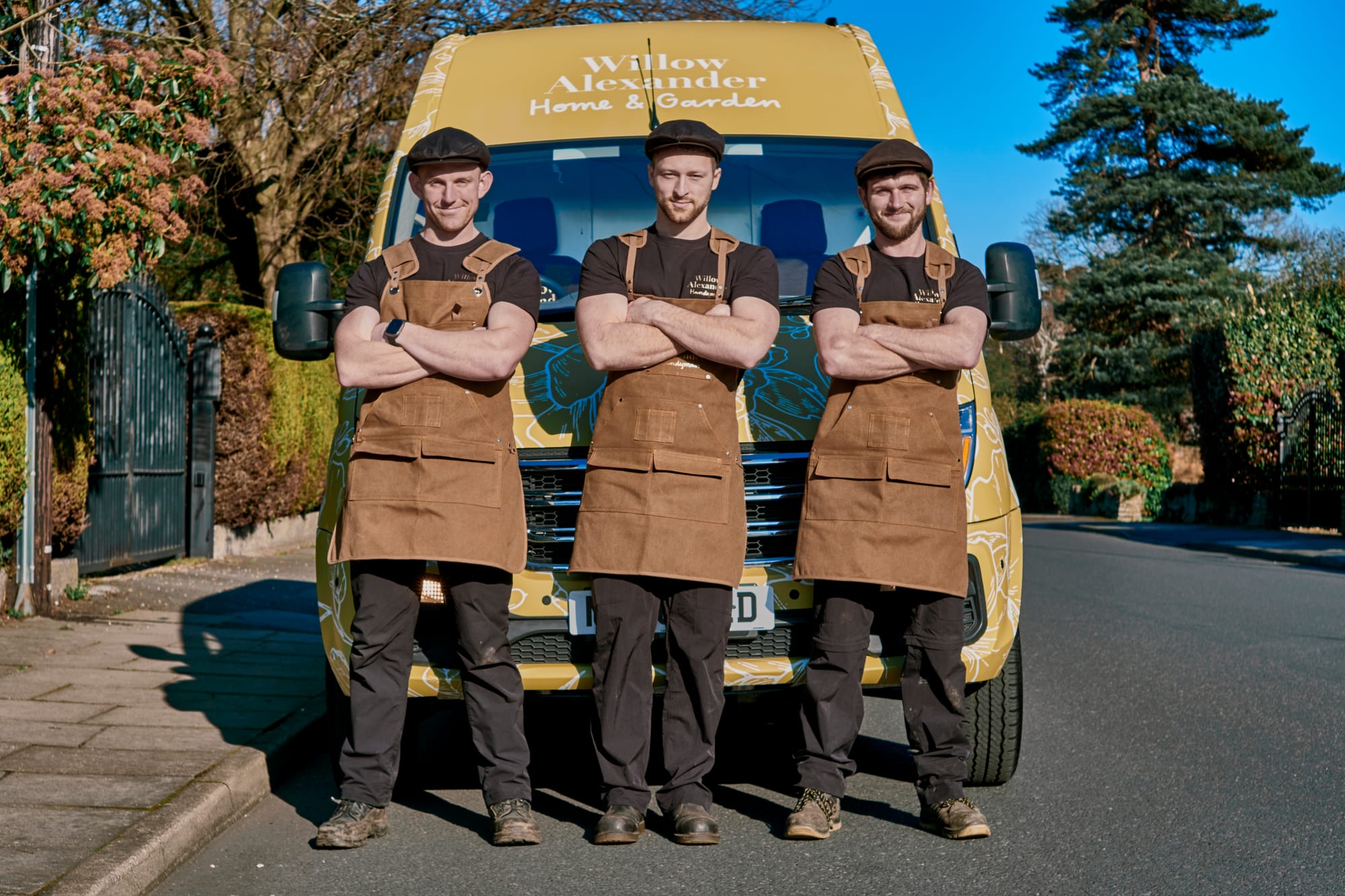 A Willow Alexander Removals crew loading an electric van